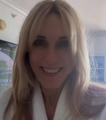 Alana Stewart travels stylishly by packing all-white ensembles with a chic black twist!!