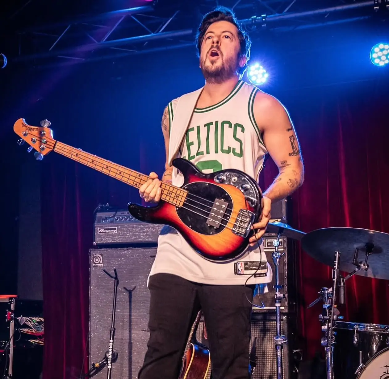 Actor-musician treats his band to NBA action after electrifying performance in Massachusetts.