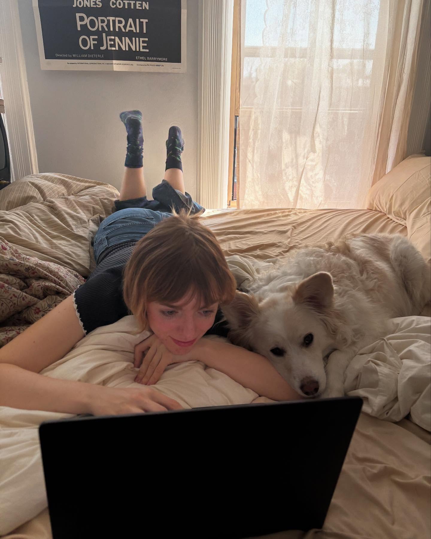 Elsie Fisher Shares Adorable Work Moment With Furry Associate On Instagram The young star showcases her playful side while handling 'important business' with canine friend.