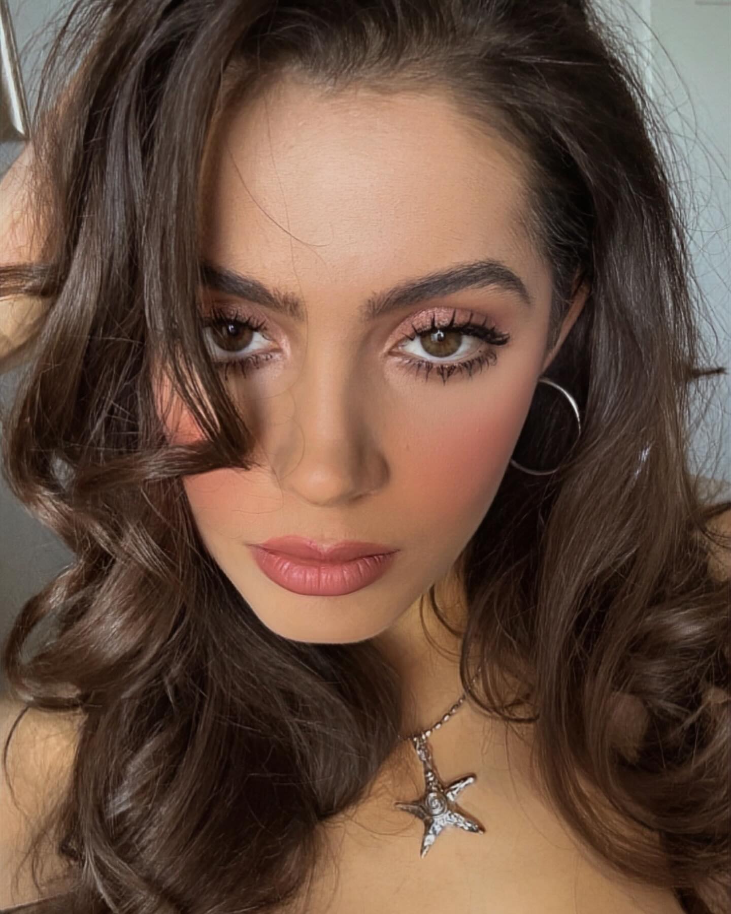 Emmy Perry Shines In Playful Instagram Emoji Post The actress dazzles fans with sparkling emojis and a fresh portfolio on IG