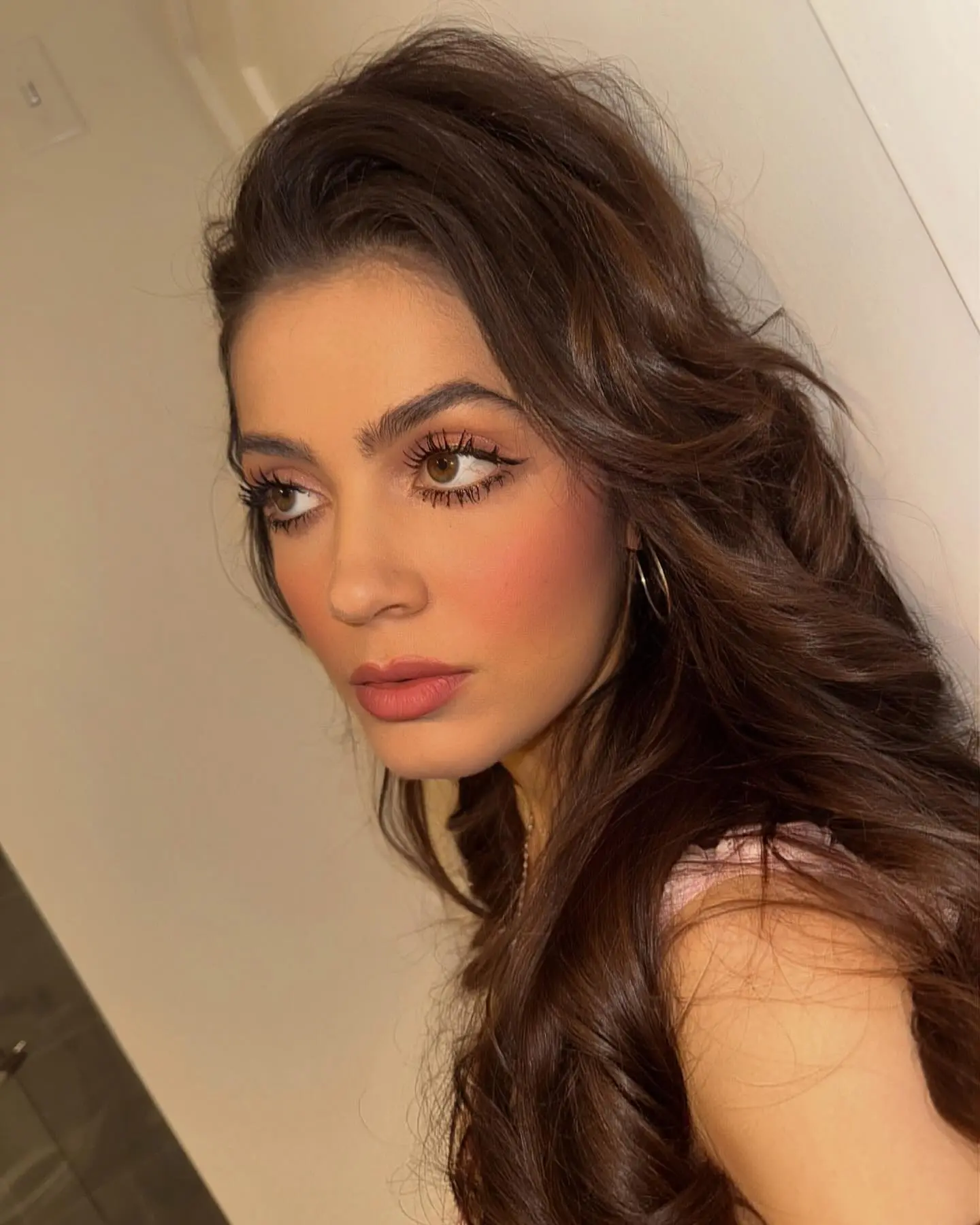 Emmy Perry Shines in Playful Instagram Emoji Post