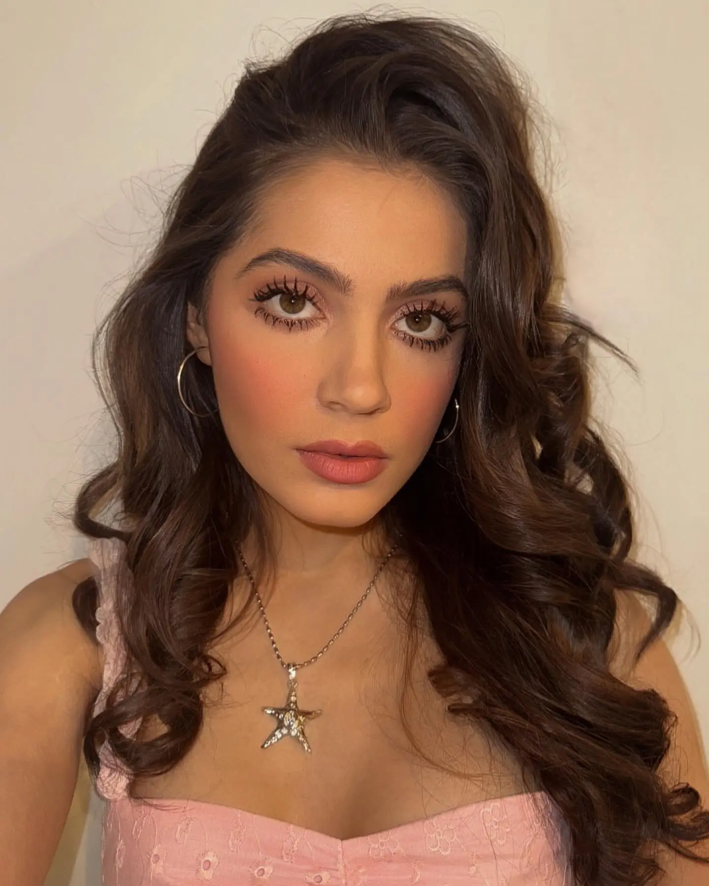 Emmy Perry Shines in Playful Instagram Emoji Post
