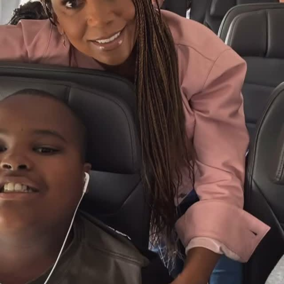 Holly Robinson Peete’s Mock Flight Event A vibrant mock flight fuels family fun and autism awareness as Holly and Joel soar high.