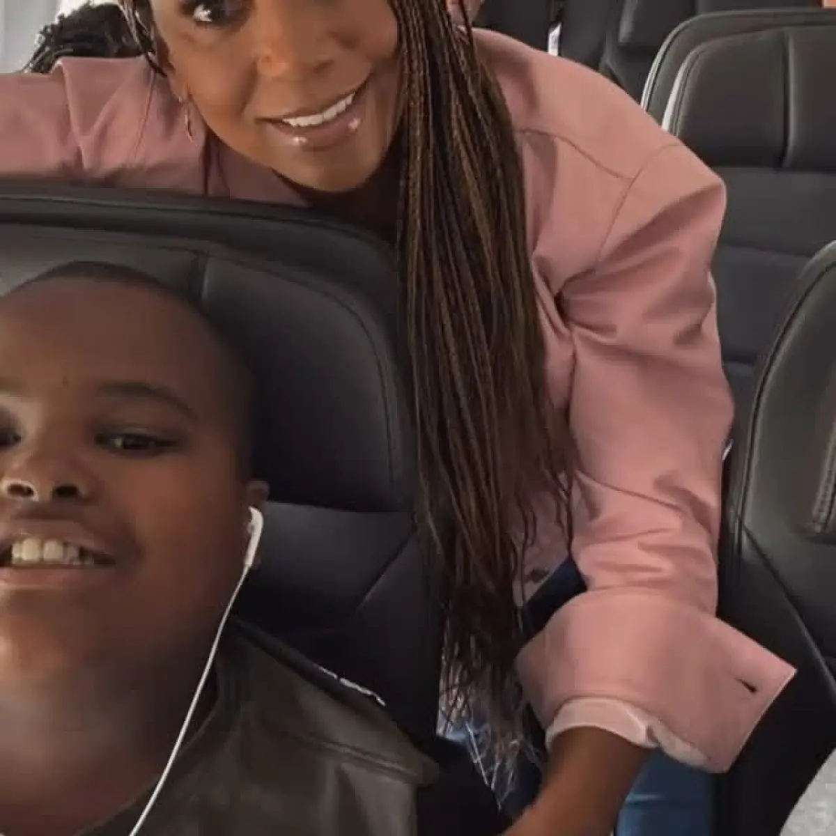 Holly Robinson Peete’s Mock Flight Event A vibrant mock flight fuels family fun and autism awareness as Holly and Joel soar high.