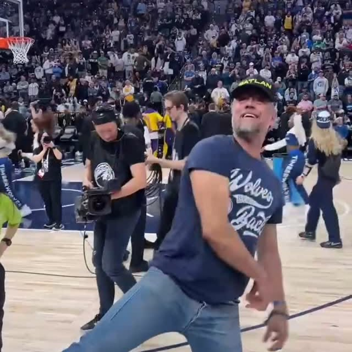Josh Duhamel rallies for Wolves with VIP seats, celebrating sports spirit and star style!.