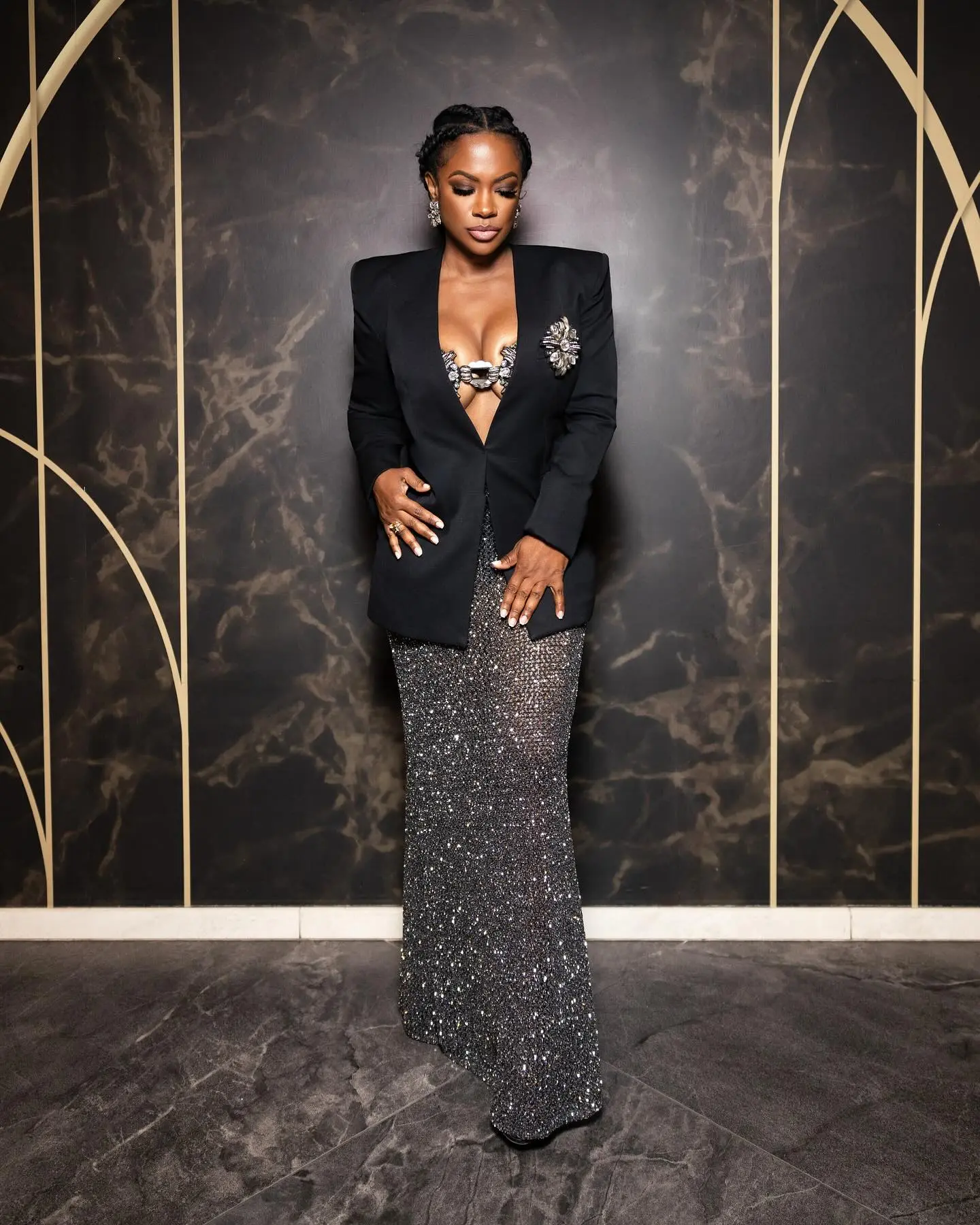 The RHOA star and Grammy-winning songwriter showcases radiant elegance in latest Instagram post.