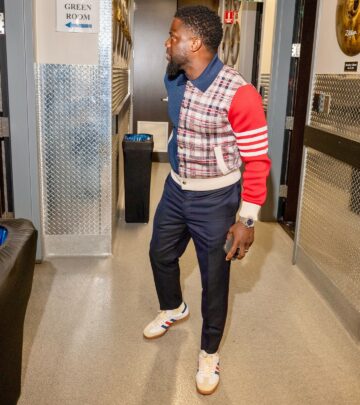 The comedian rocks designer wear in his new post.