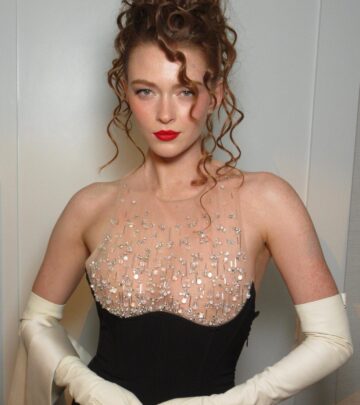 Model-dancer stuns in Elisabetta Franchi gown with LAGOS jewelry for prestigious fashion event