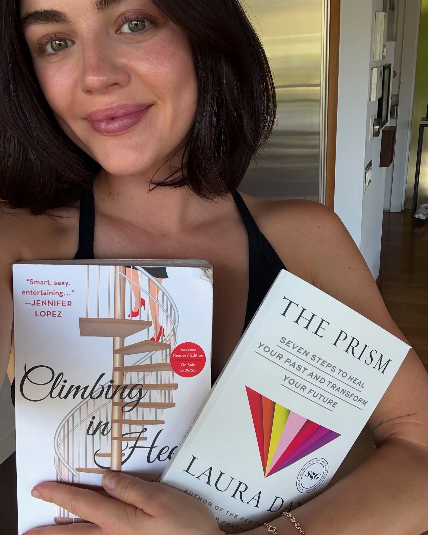 Lucy Hale Celebrates New Book Releases Lucy Hale cheers two debut books—Climbing in Heels & The Prism—in one inspiring post!!