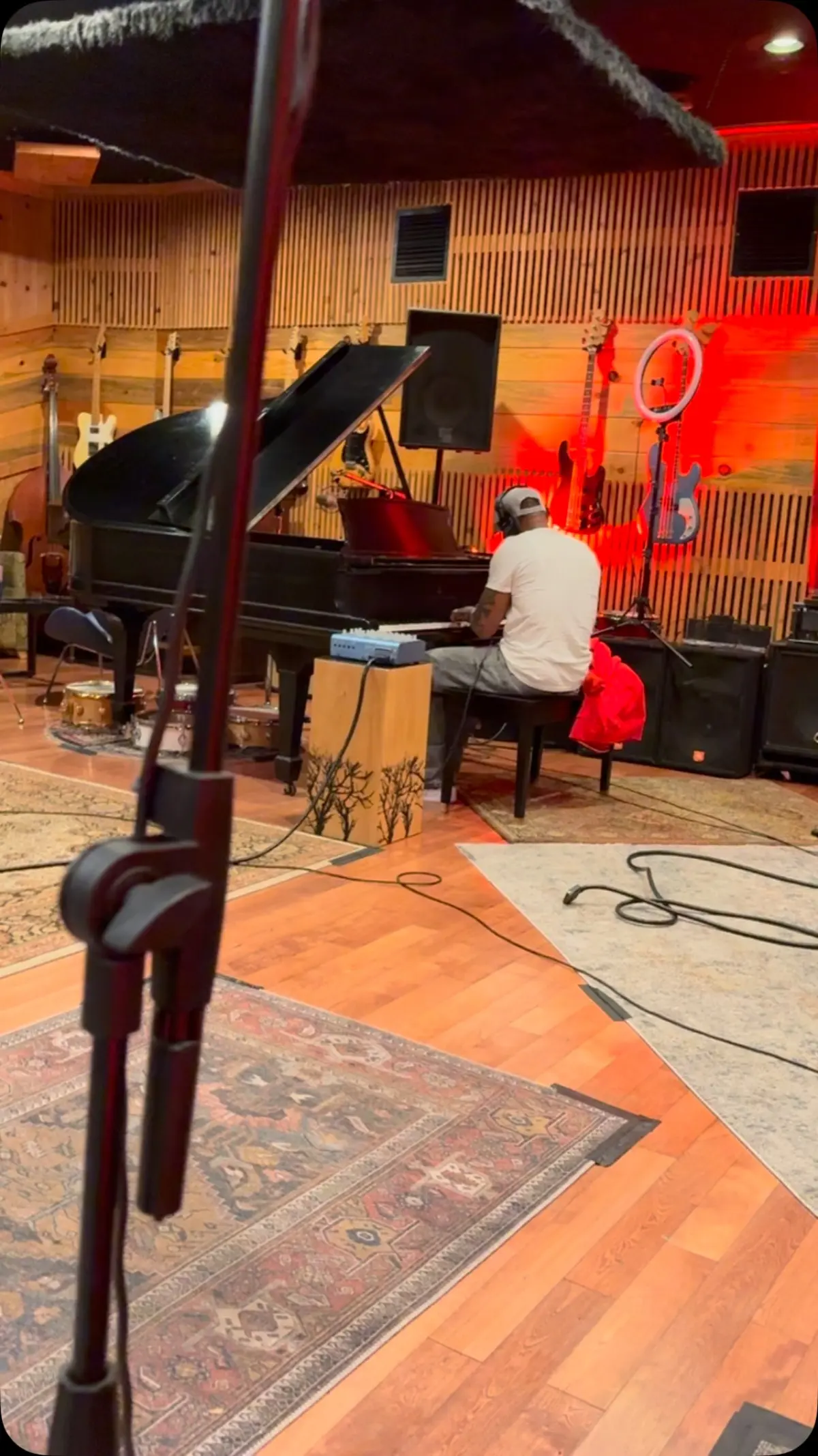 Grammy-winning vocalist enters studio with hitmaker.