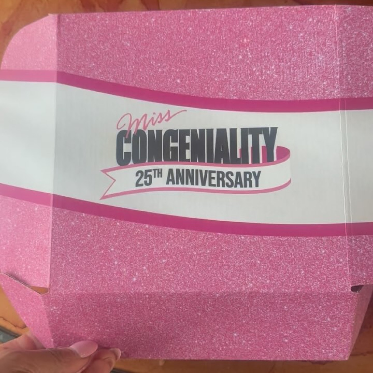 Wendy Raquel Robinson marks 25 years of Miss Congeniality with heartfelt tribute and style.