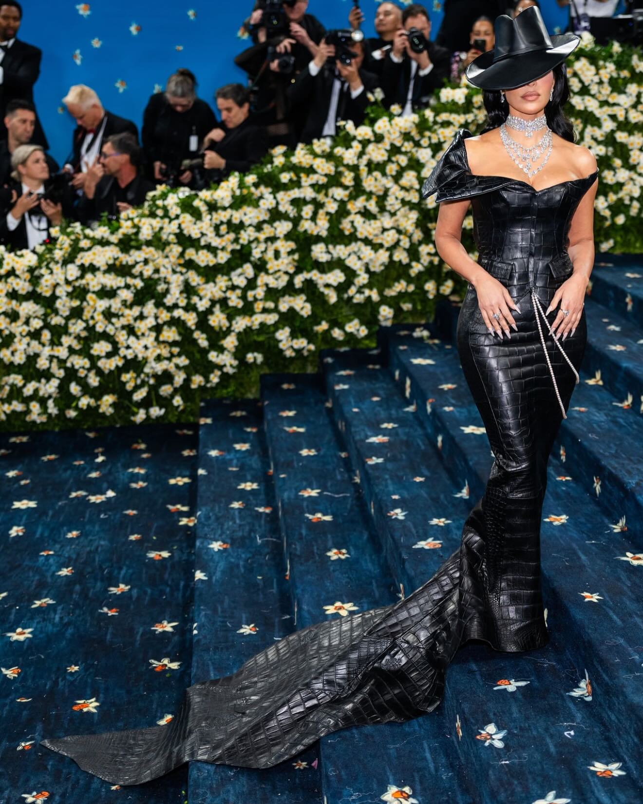 Honoring dandy heritage with chrome hearts, sharp tailoring and black style at Met Gala.
