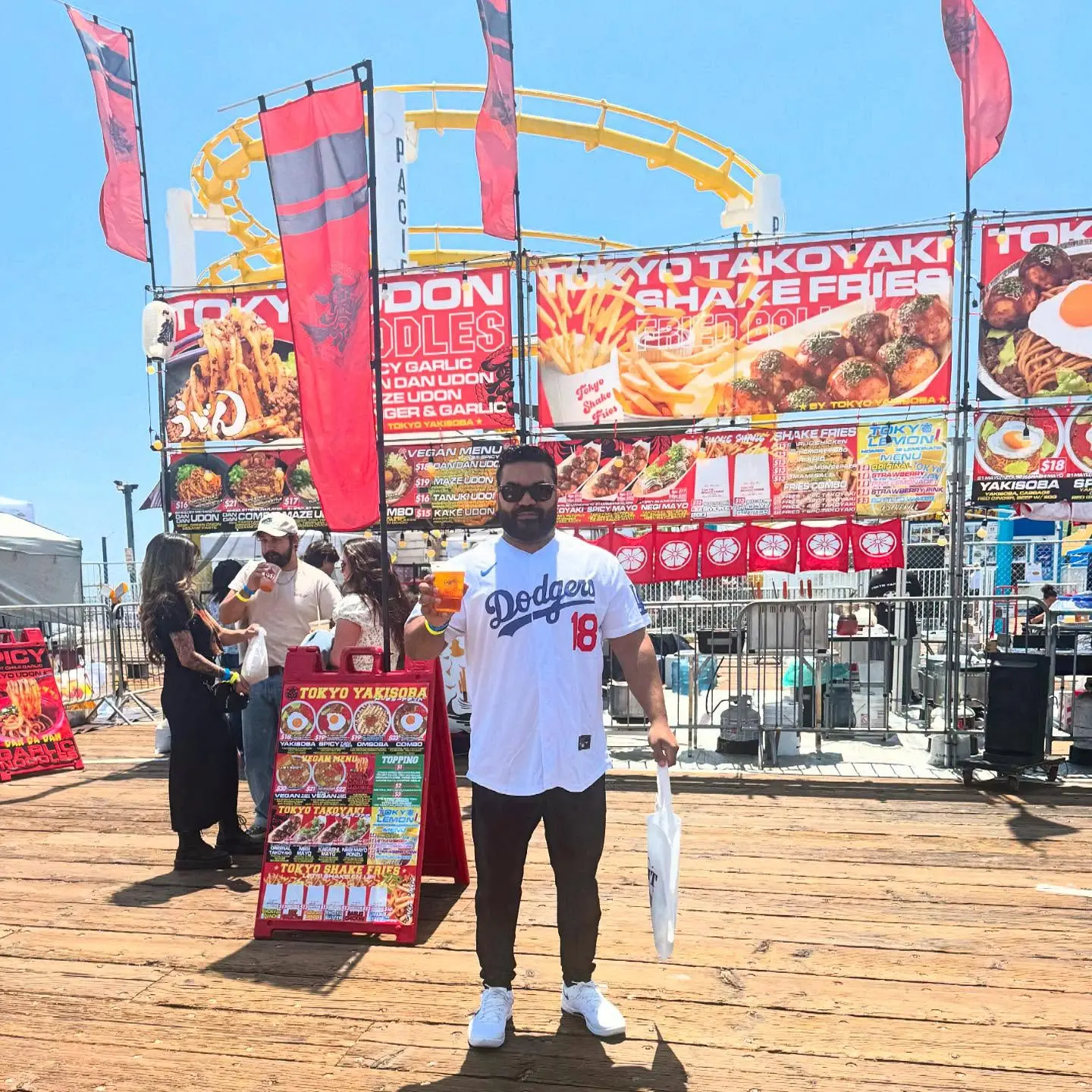 Adrian Dev revels in Japanese culinary delights at Konamon Fest, celebrating AAPI heritage.