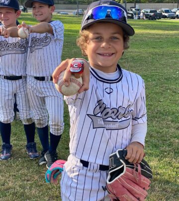 Celebrity Alfonso Ribeiro beams with pride as his son Anders clinches championship honors!
