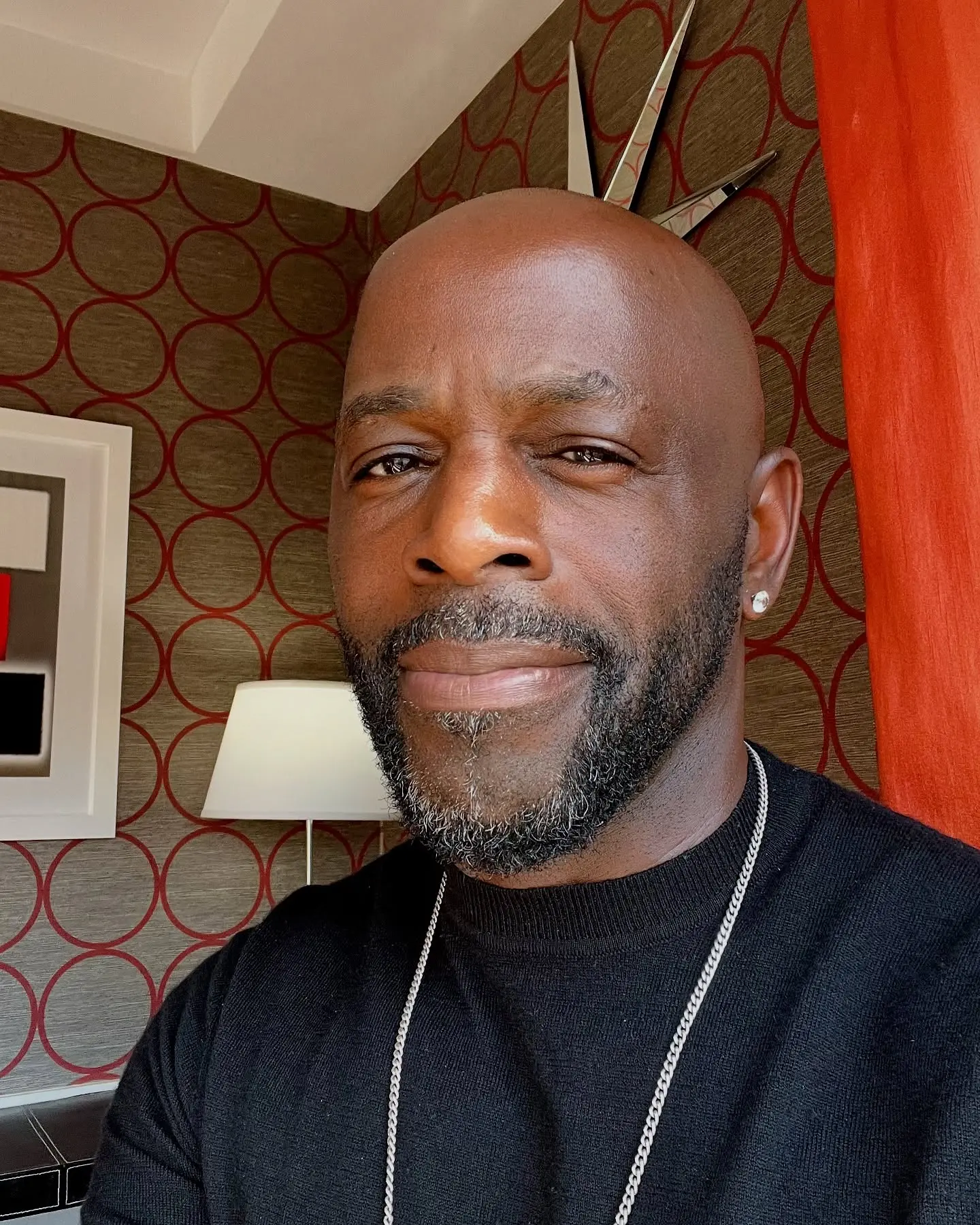 Vibrant emojis radiate pure warmth in Alimi Ballard’s Instagram post of sincere affection.