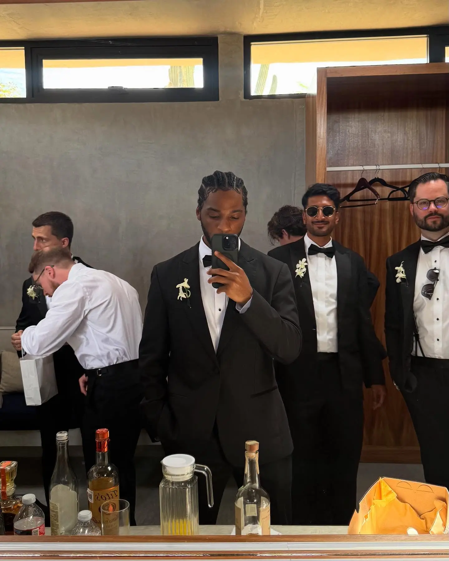 Armani White Celebrates Bond With Fellow Groommen Uniting cherished friends in a groommen celebration that marks trust and shared joy today!