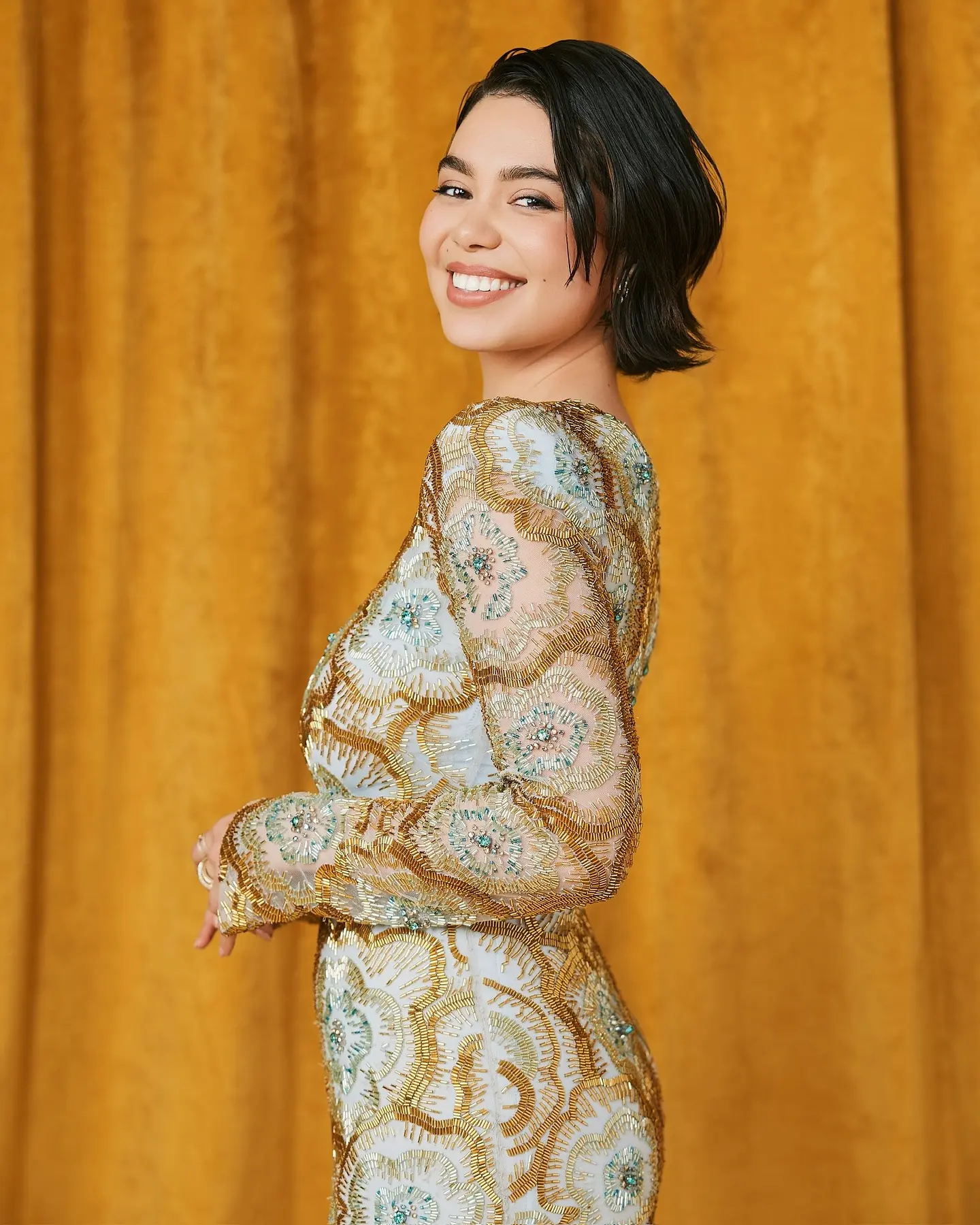 The Disney star dazzles in luxurious gold, capturing attention on social media with style.