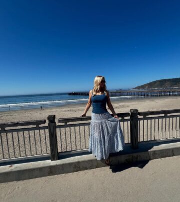 Celebrity lifestyle update as Barbara relaxes by the serene, blue coastal ambiance.
