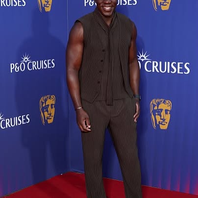 Belcher Dazzles at BAFTA: A Night of Elegance