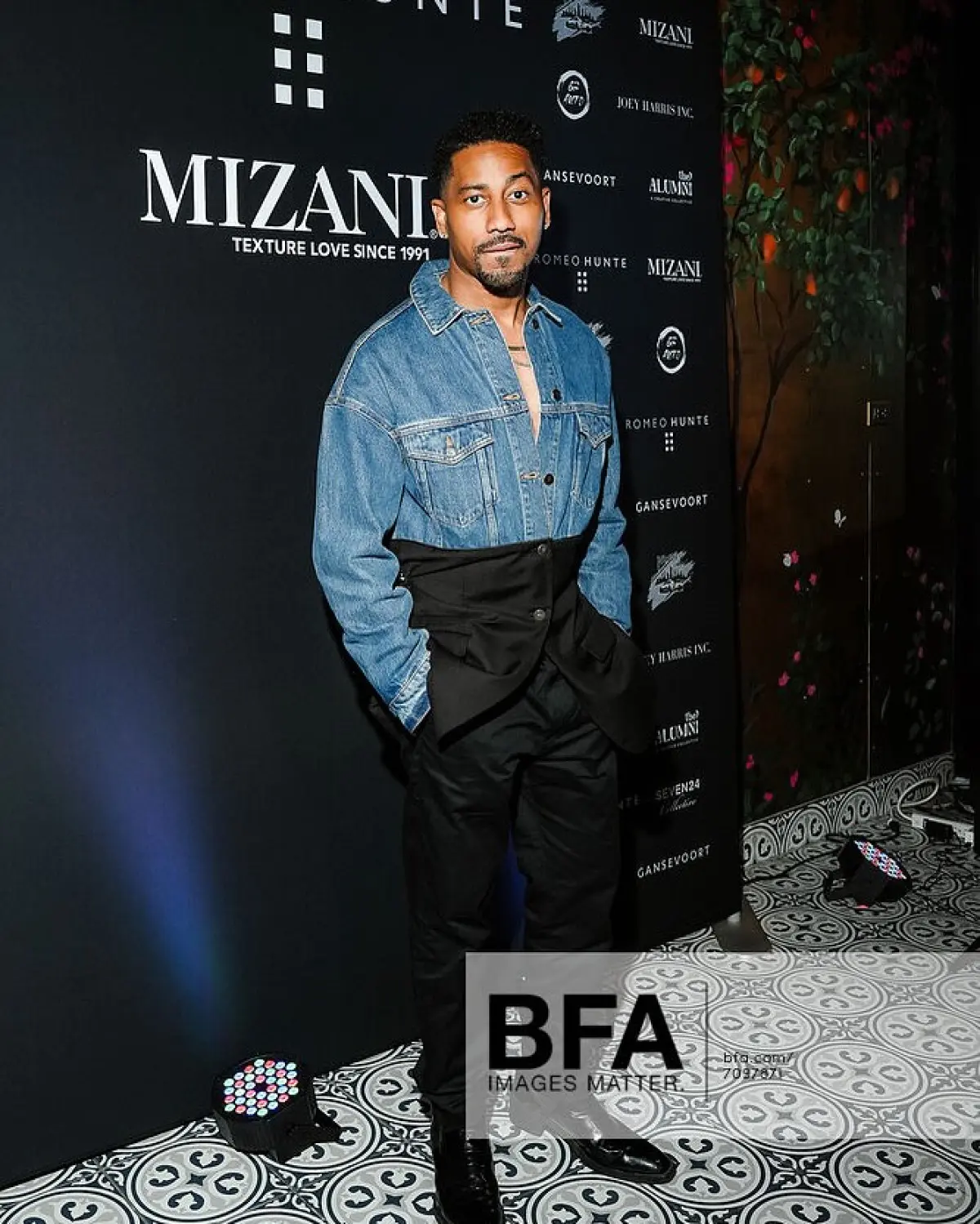 Chic Afterparty: Romeo Hunte and Angel revamp Brandon T. Jackson’s look with flair.
