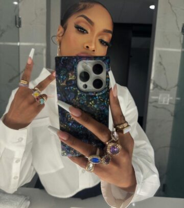 Her latest Instagram swipe showcases timeless bold flair and promise to repeat this moment.