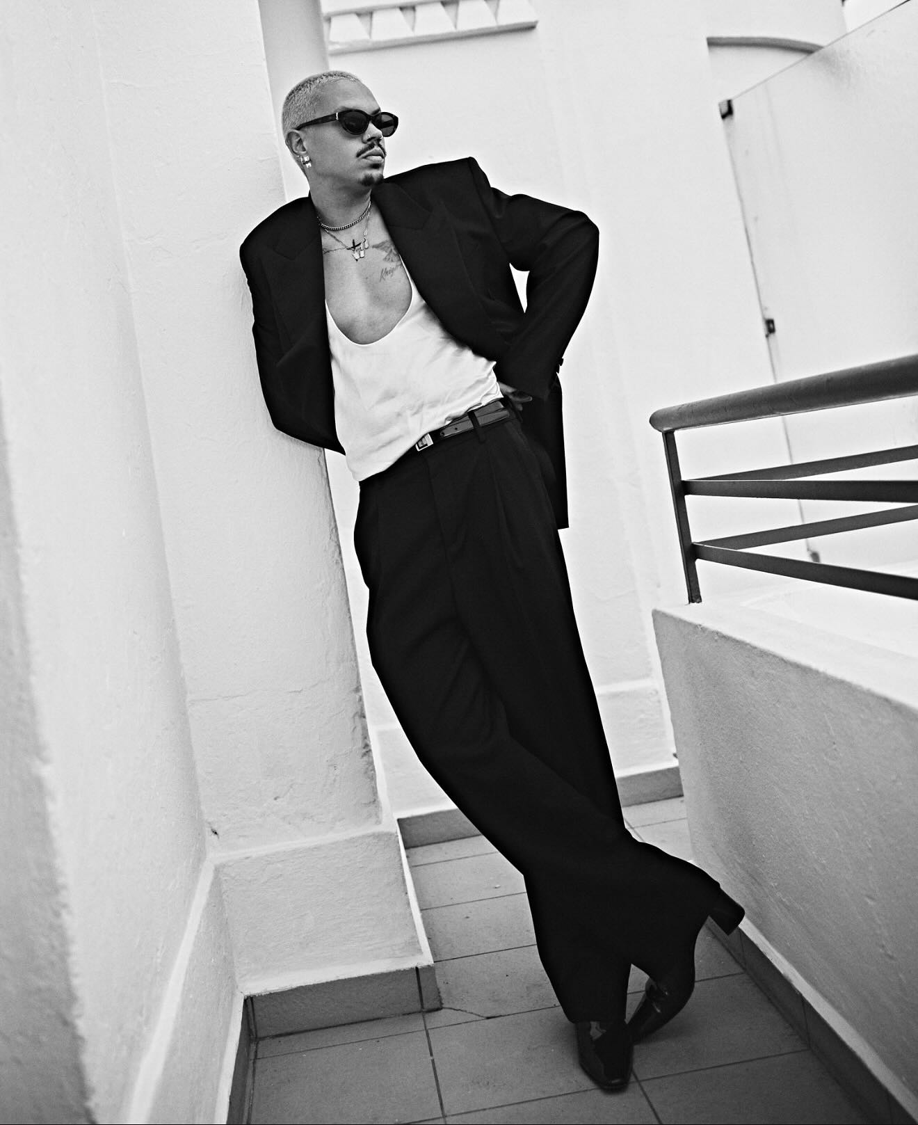 Cannes Glam: Evan Ross Stuns with Family Style Evan Ross stuns at Cannes with chic family flair in elegant YSL couture and radiant style.
