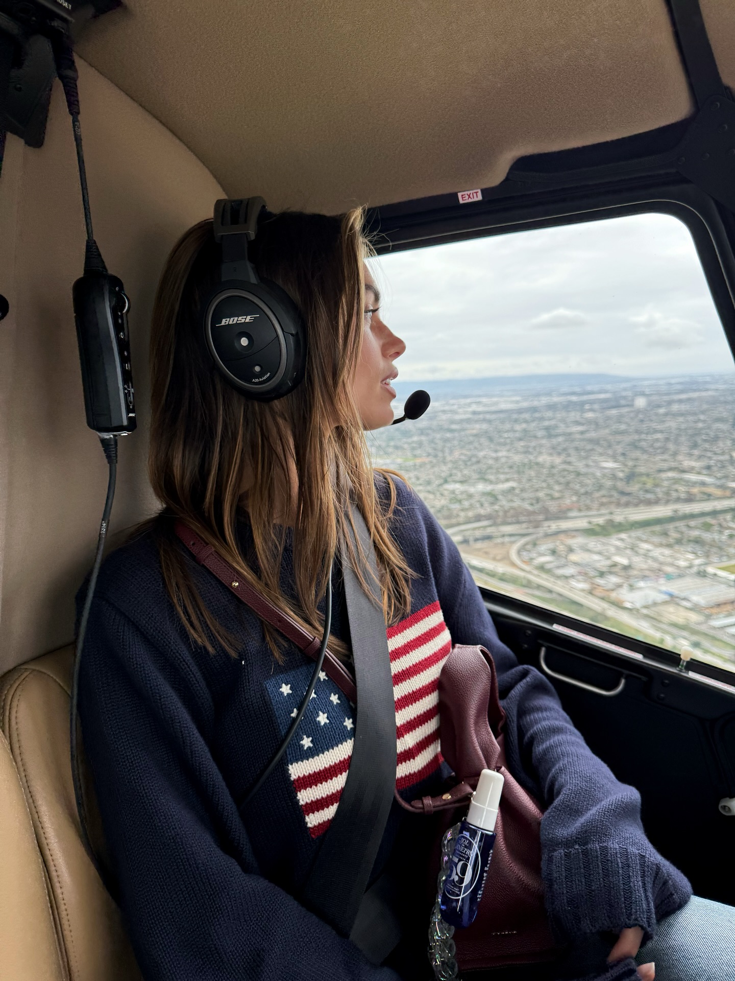 Captain Charlie Speaks With Urban Aerial View