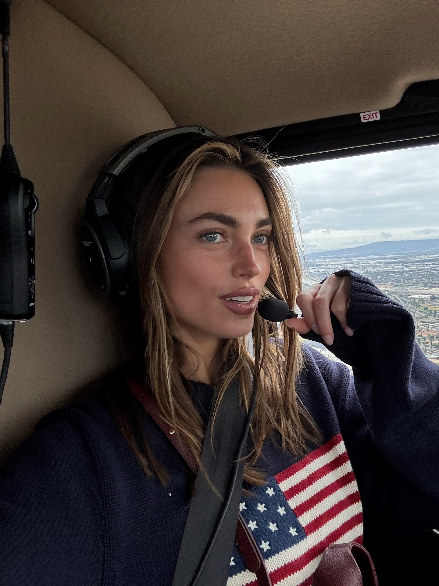 Captain Charlie Speaks With Urban Aerial View