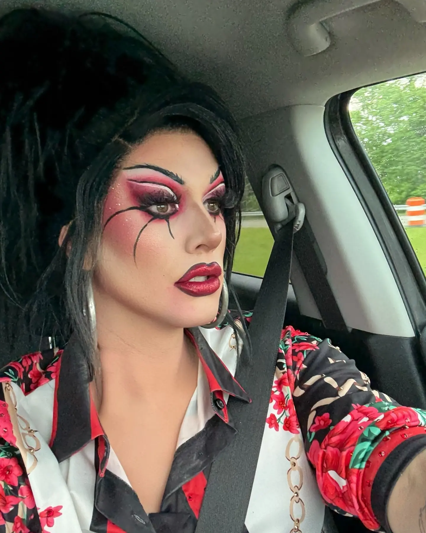 Car Lighting Hits Right In Drag Star’s Mug Check Dusty Ray Bottoms dazzles at Big Bar Louisville with a mug check and stunning car lighting.