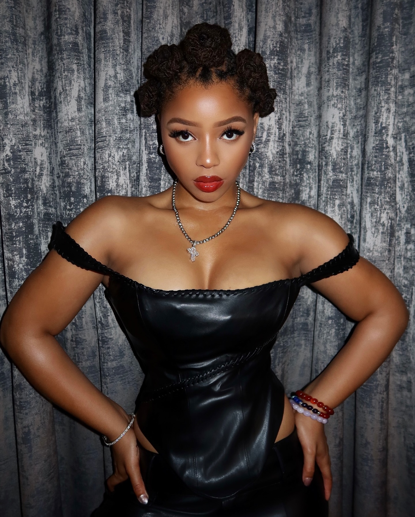 Chloe Bailey Rocks Bold Red Lip & Bantu Knots Look