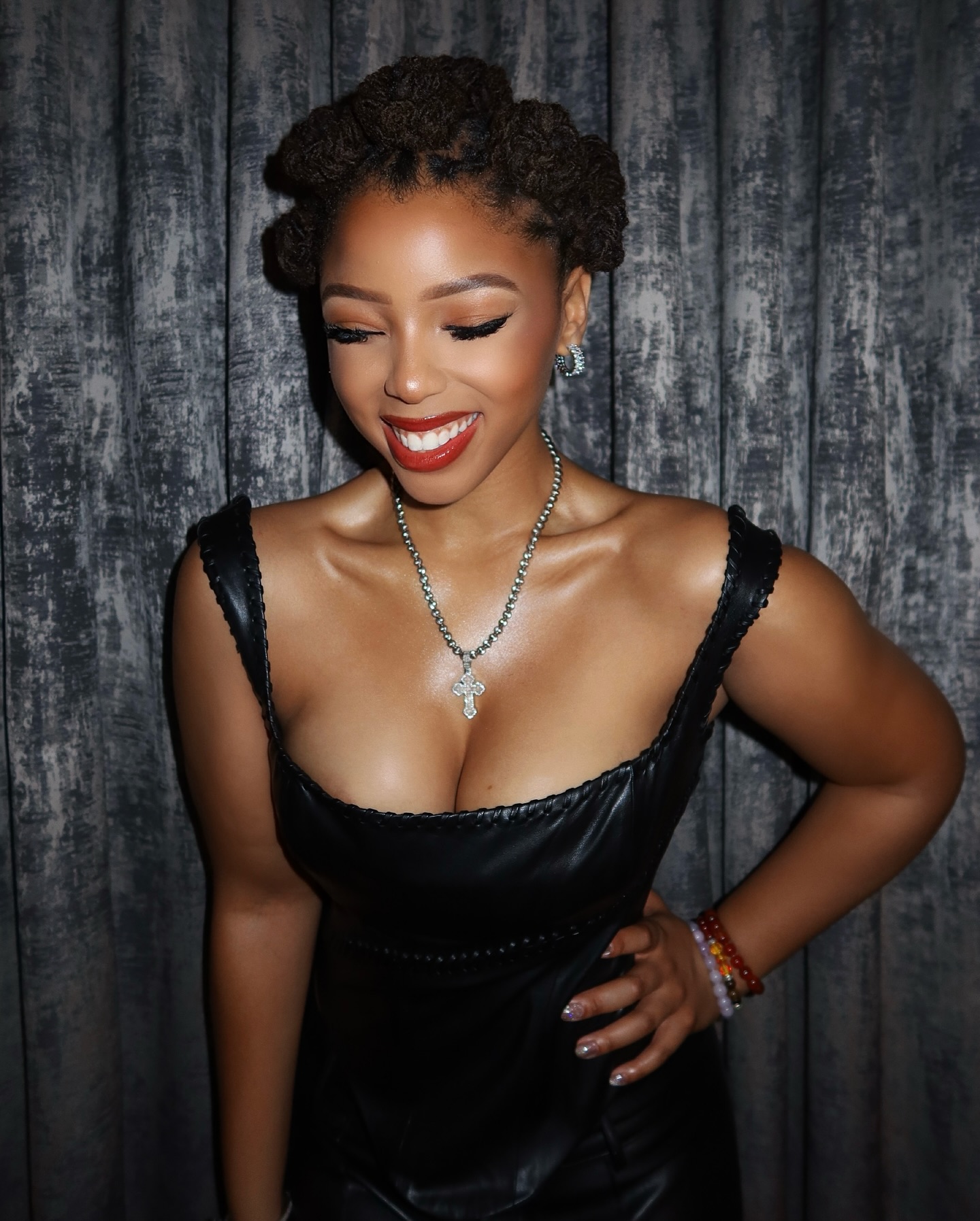 Chloe Bailey Rocks Bold Red Lip & Bantu Knots Look