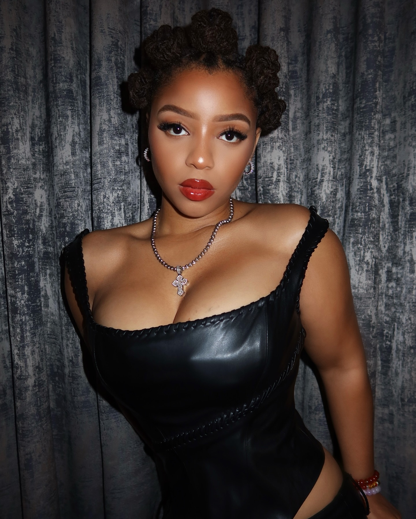 Chloe Bailey Rocks Bold Red Lip & Bantu Knots Look
