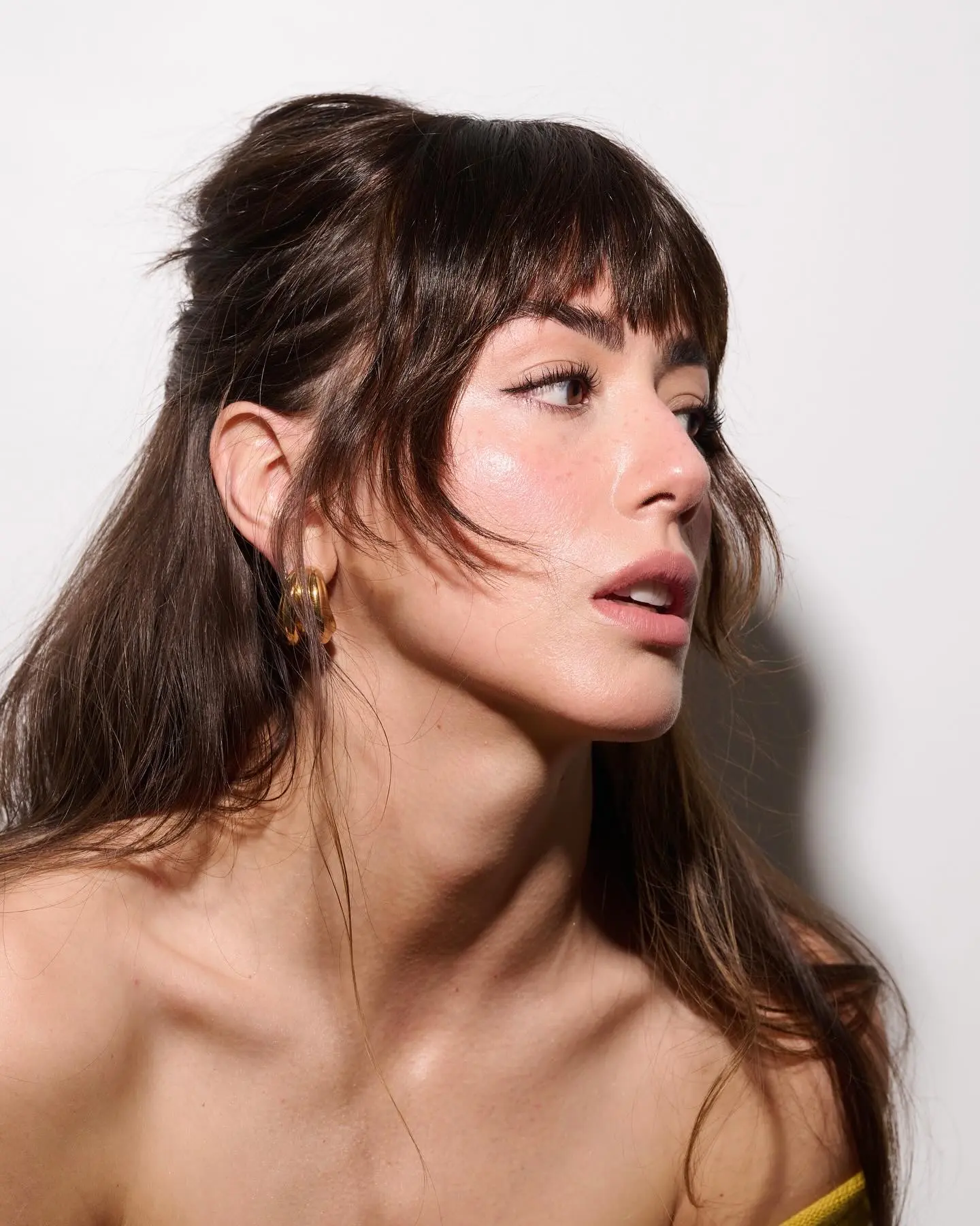 Chloe Bennet Sports Bold Bangs Transformation