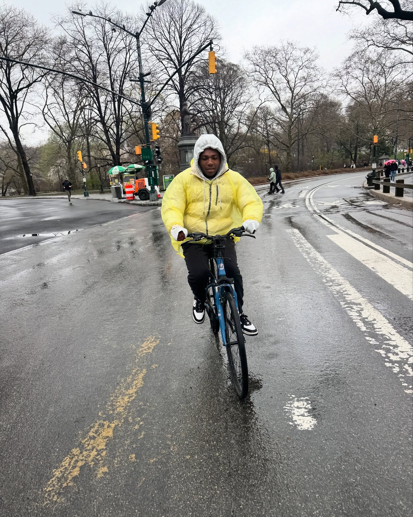Christian J. Simon Braves NYC Rain at Central Park