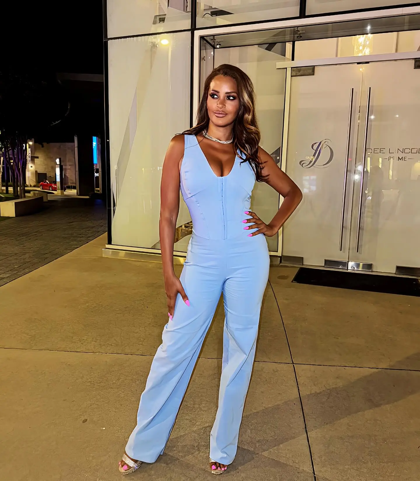 Claudia Jordan shows love for vintage hip hop beats, exuding a chic, timeless vibe in style.