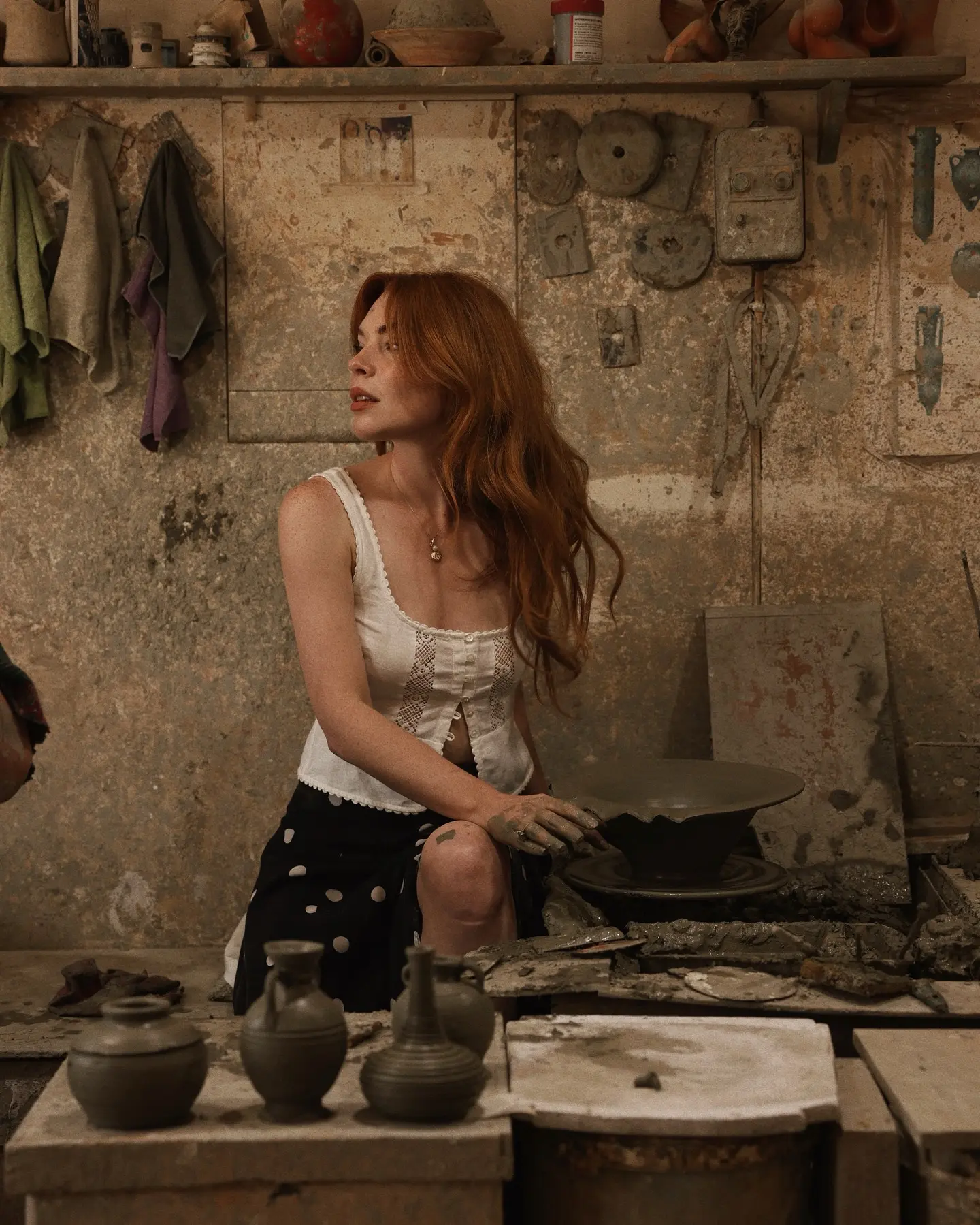 The influencer trades her camera for clay at a traditional pottery studio in Santorini!!!