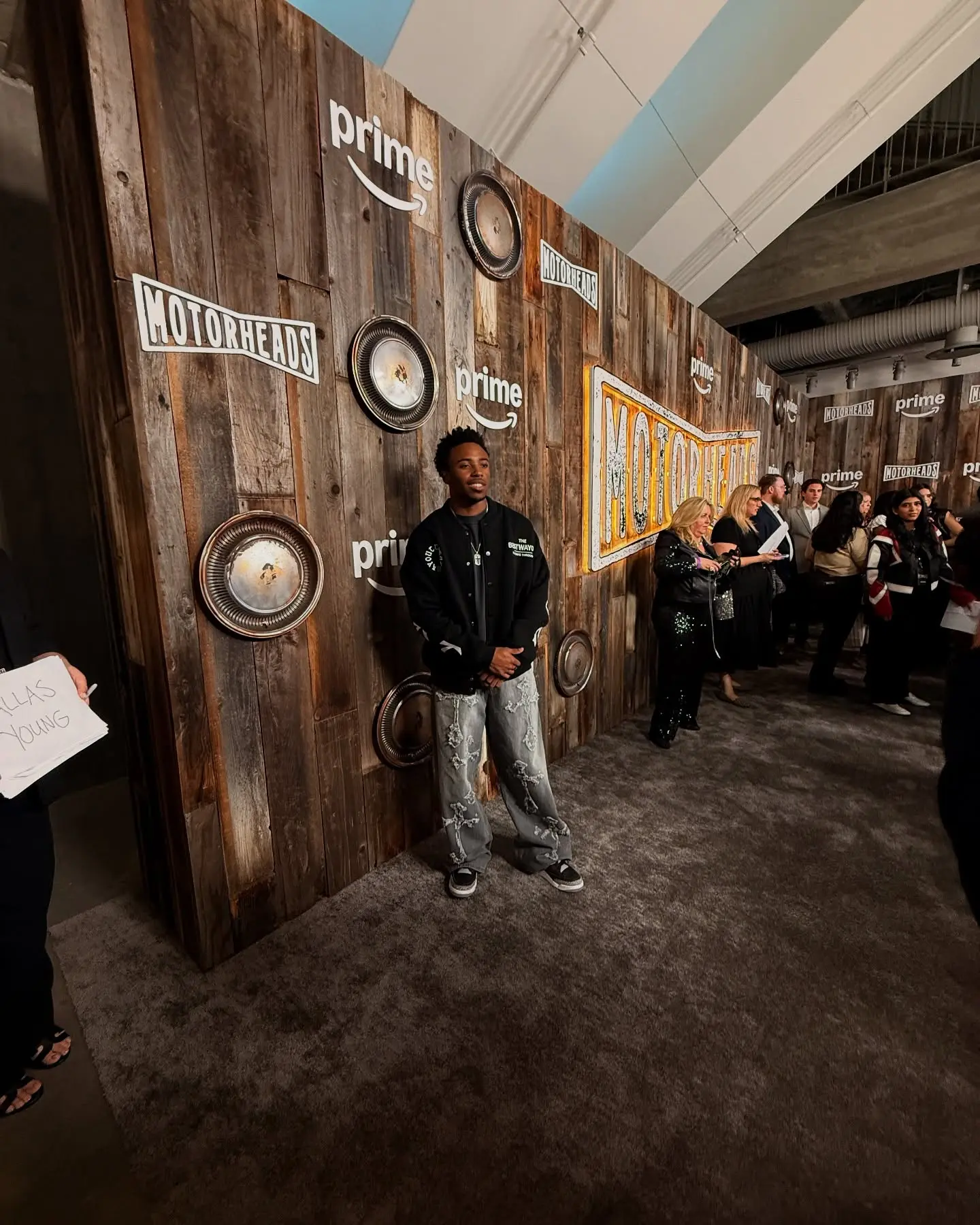Actor Dallas Dupree Young dazzles at motor premiere, merging style and automotive passion.