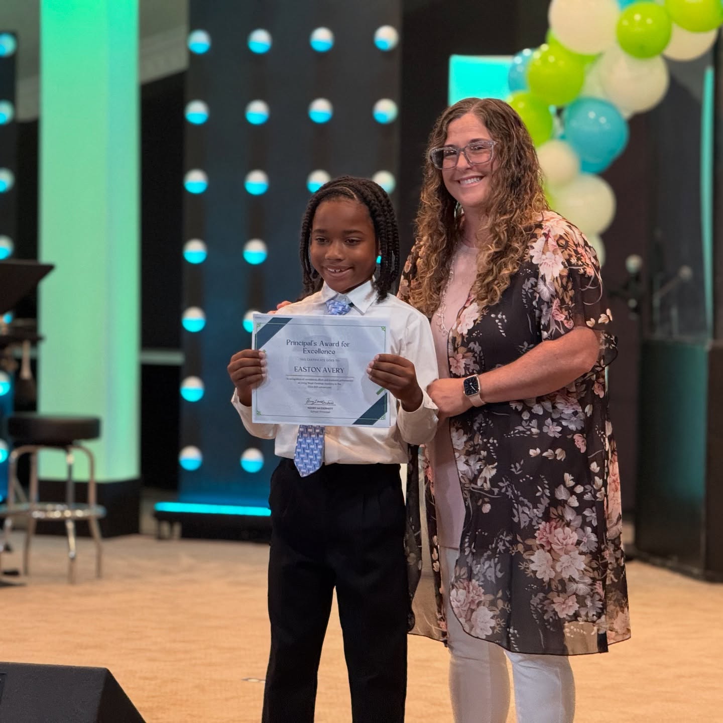 DJ Holiday Celebrates Children’s Academic Triumphs