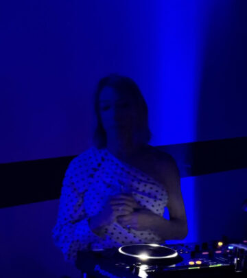 A high-energy event featuring DJ beats at Cannes with nods to iconic names and emerging trends.