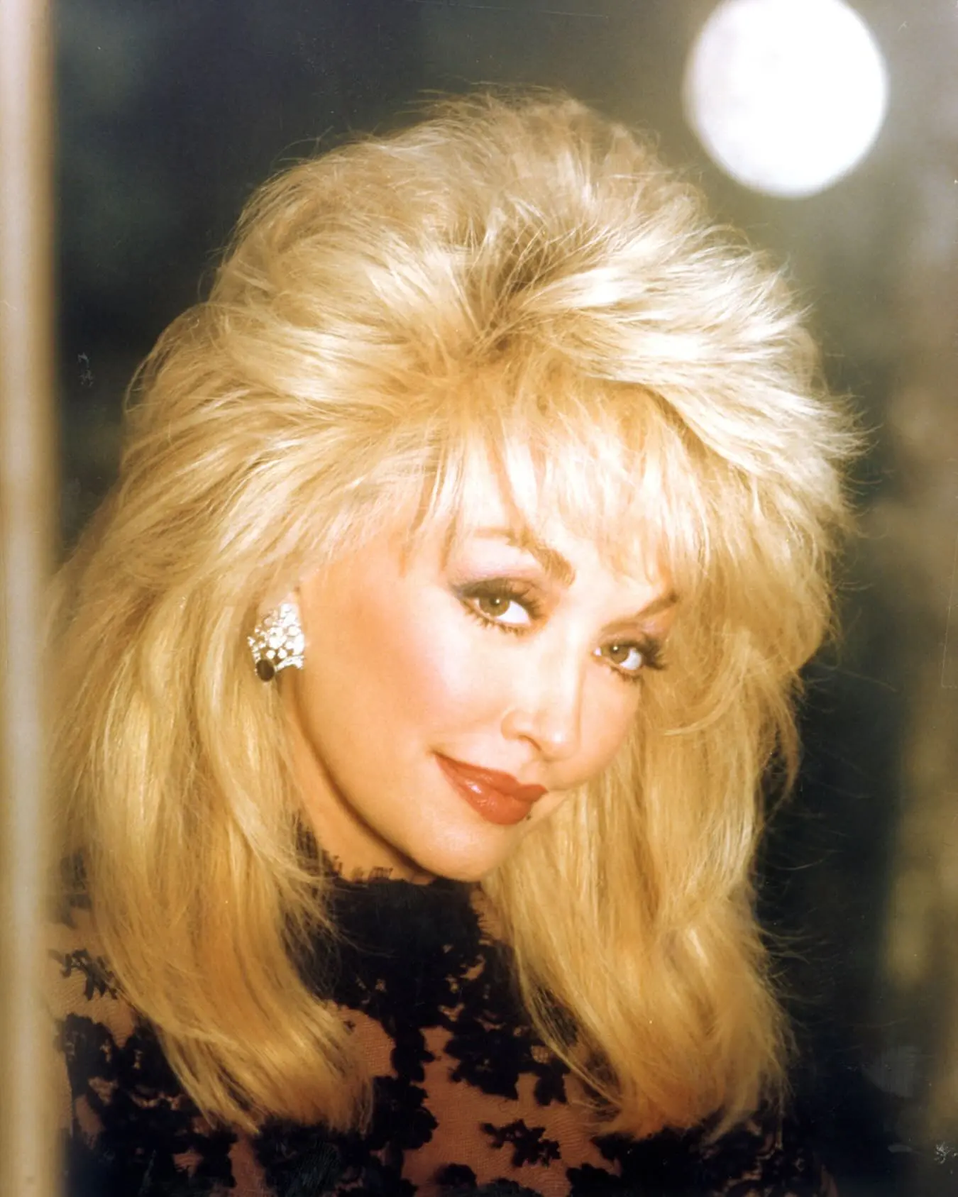 Dolly Parton Embraces Timeless Glamour Iconic Dolly evolves through glamour, merging heritage with a fearless and radiant allure!