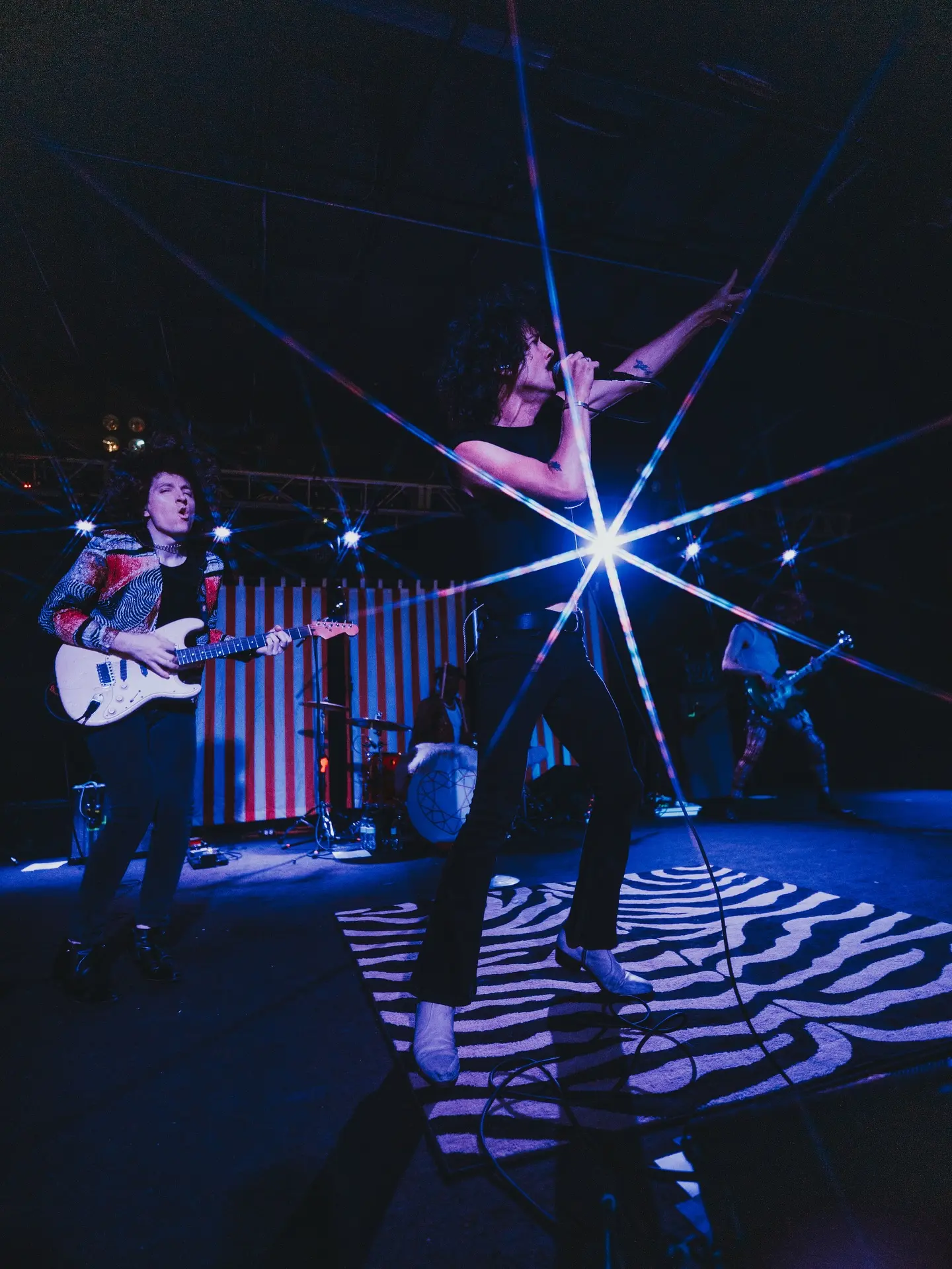 Foxy Shazam Shines In Perfect Lighting A striking snapshot as Foxy Shazam radiates unmatched style and electric energy in frame!!