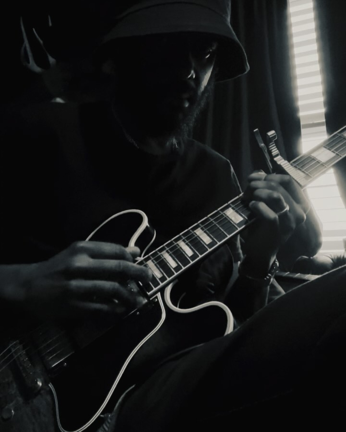 Stage banter as Gary Clark Jr. recalls a playful reverb quip from Eric Clapton that wowed