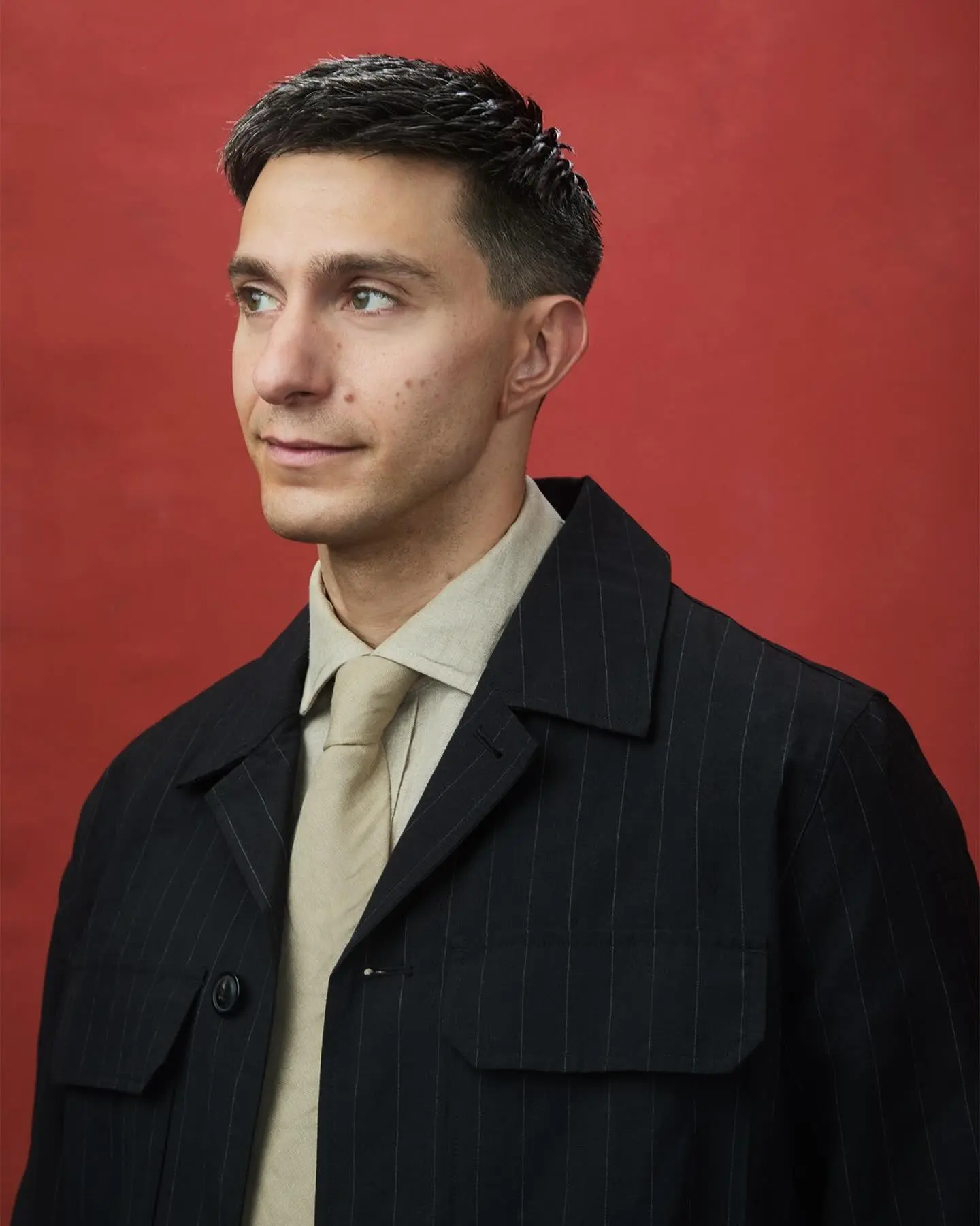 Gideon Glick stuns in a chic Variety shoot by top stylists, showcasing timeless flair truly.
