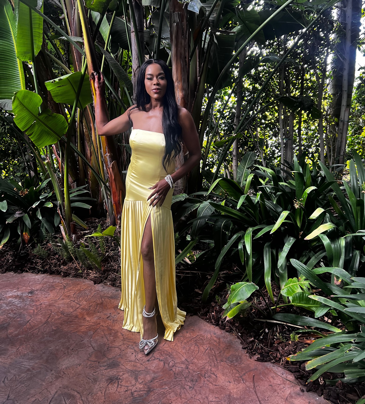 Golden Brooks Shines In Yellow At Wedding Celebration Golden shines as she celebrates wedding vibes in a vibrant yellow dress with loving mama!!