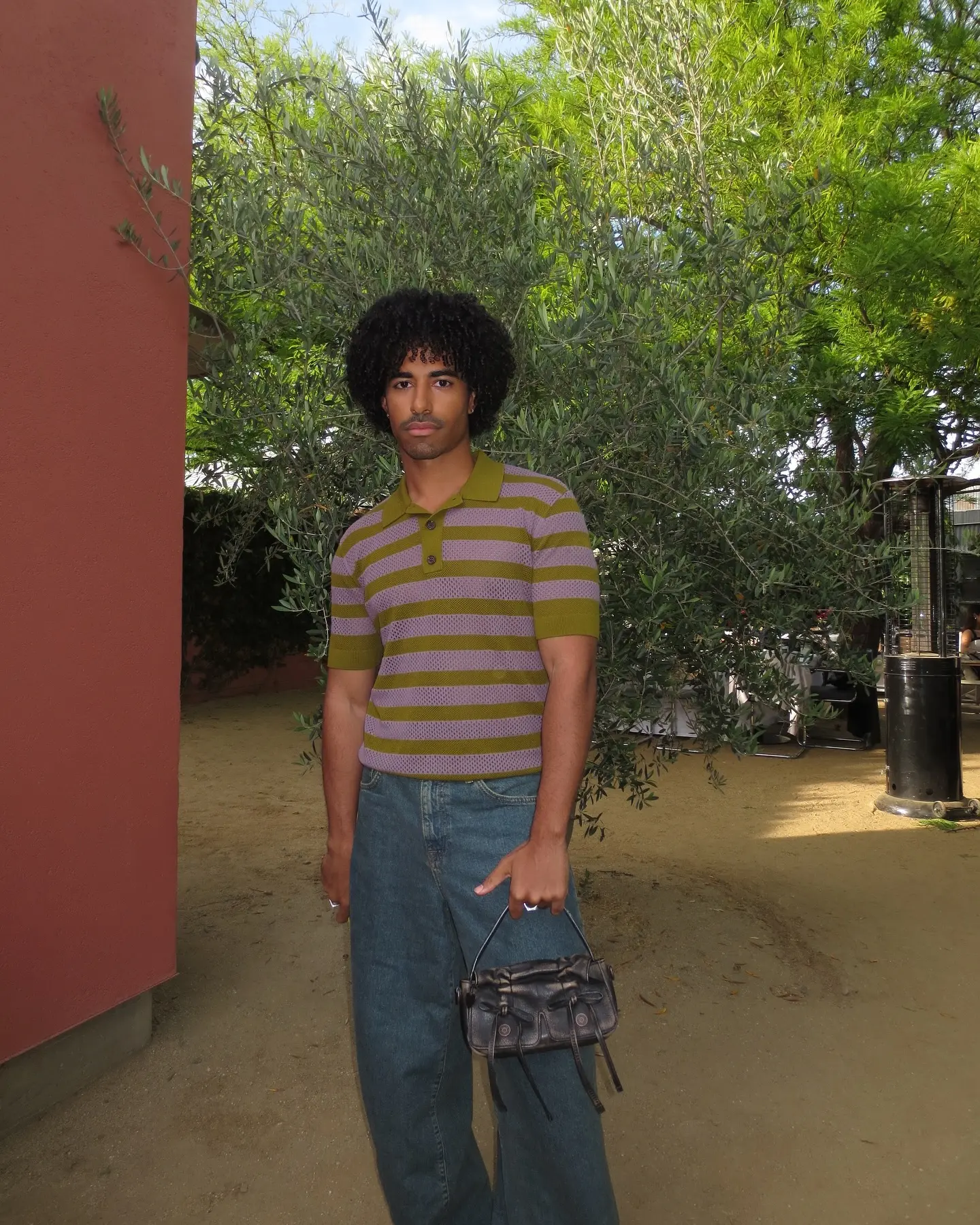 Good Hair Day: Boman Martinez-Reid Shines Boman Martinez-Reid sports vibrant locks and playful energy, charming fans in style - Rad!