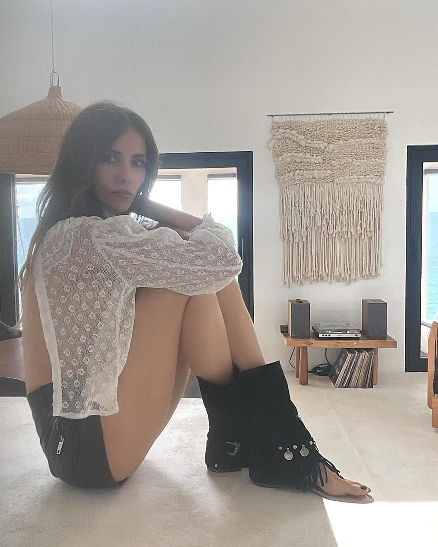 Gregoria Toledo Enchants With New Layerboots Look Icon Gregoria Toledo stuns with a celestial dash of chic layerboots style in pure elegance.