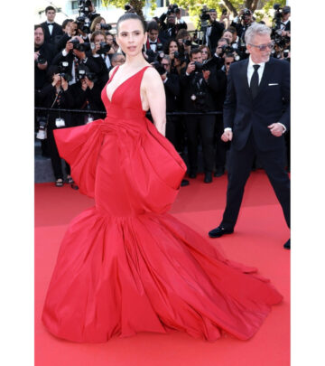 At Cannes, Hayley Atwell stuns in red silk, merging bold drama with sheer elegance, wow!!