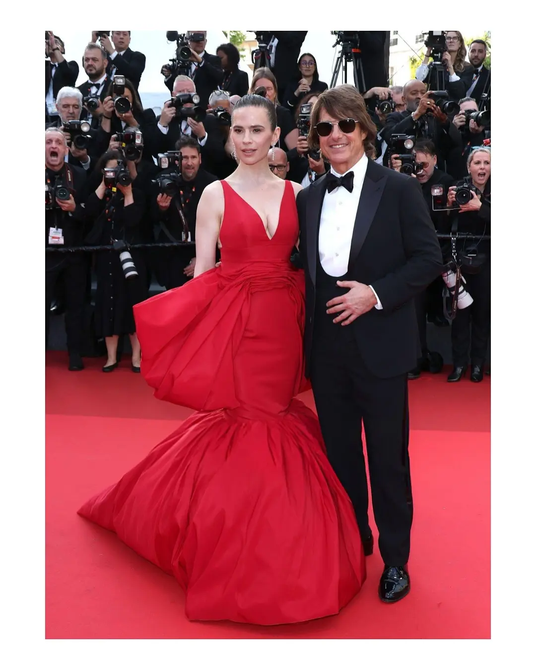 Hayley Atwell Shines In Red Silk At Cannes