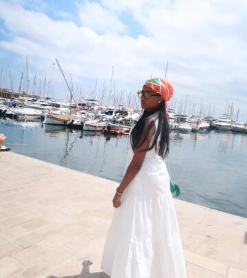 The All American star shares her seaside look, styling a maxi dress with a chic headscarf.