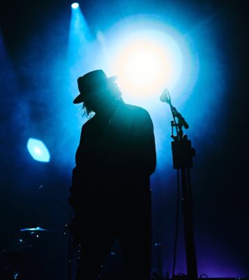Dynamic riffs and striking visuals, melded in the night of rock energy at an iconic venue.